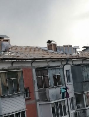 В Белгороде жители дома рискуют остаться без крыши зимой из-за капремонта