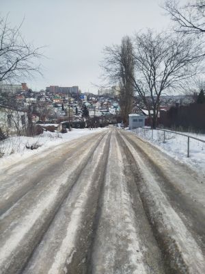 Машины застревают. Ледяные  колеи отравляют жизнь воронежцам в частном секторе 