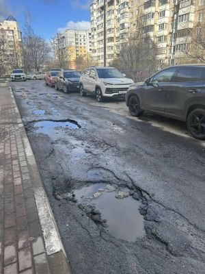 В Белгороде асфальт на дорогах сходит пластами